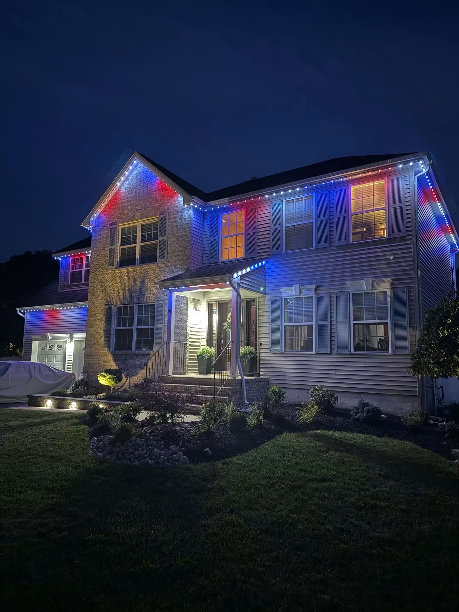 Trimlight permanent LED roofline — red, white & blue display