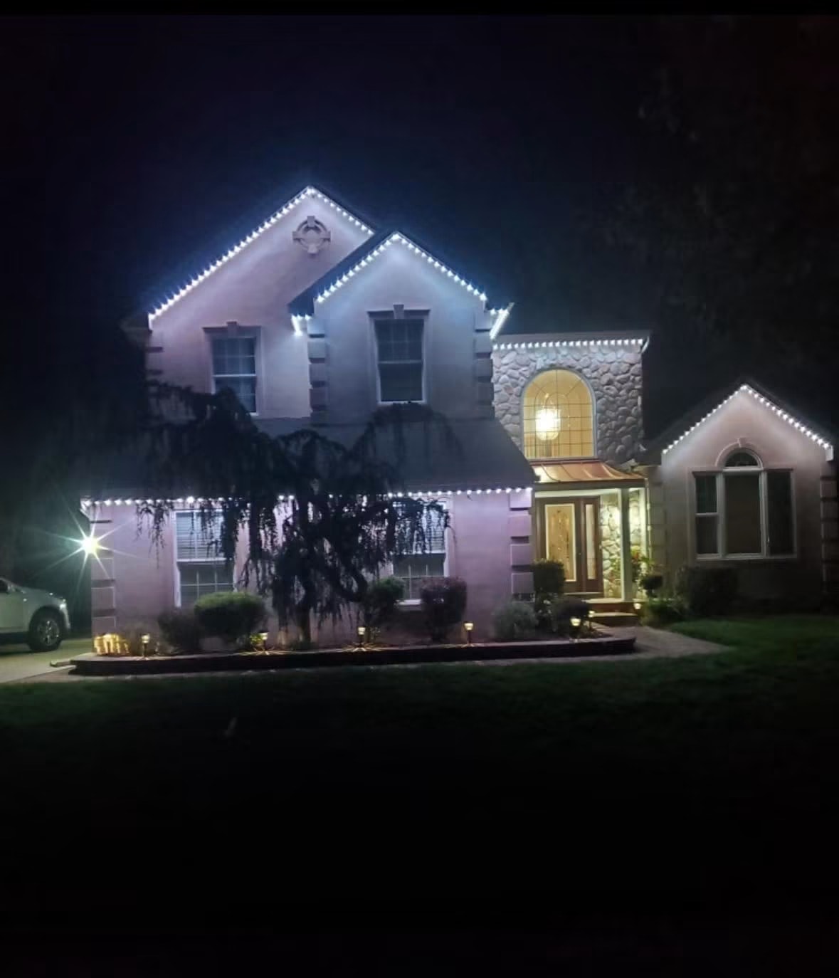 Trimlight permanent LED roofline — crisp white accent lighting